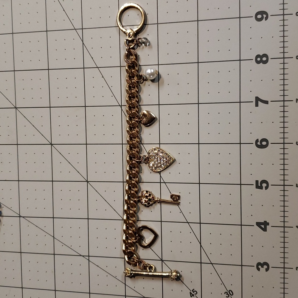 Juicy Couture charm bracelet 8in gold tone